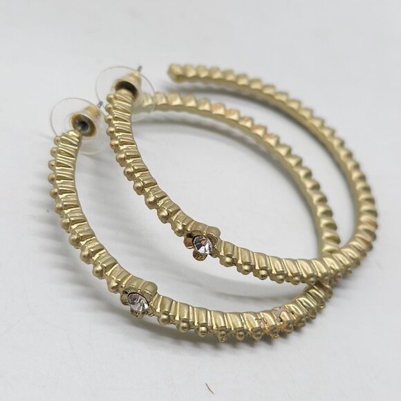 Gold Tone Textured Hoop Earrings With Rhinestone Flower Accents - Picture 5 of 7